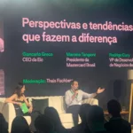 executivos da Visa Mastercard e Elo em evento da Adyen